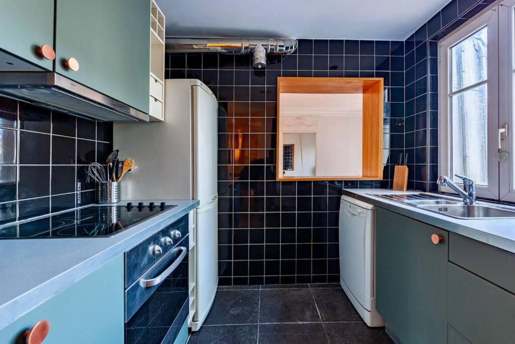 Charmant Appartement Au Coeur De Paris Eksteriør bilde
