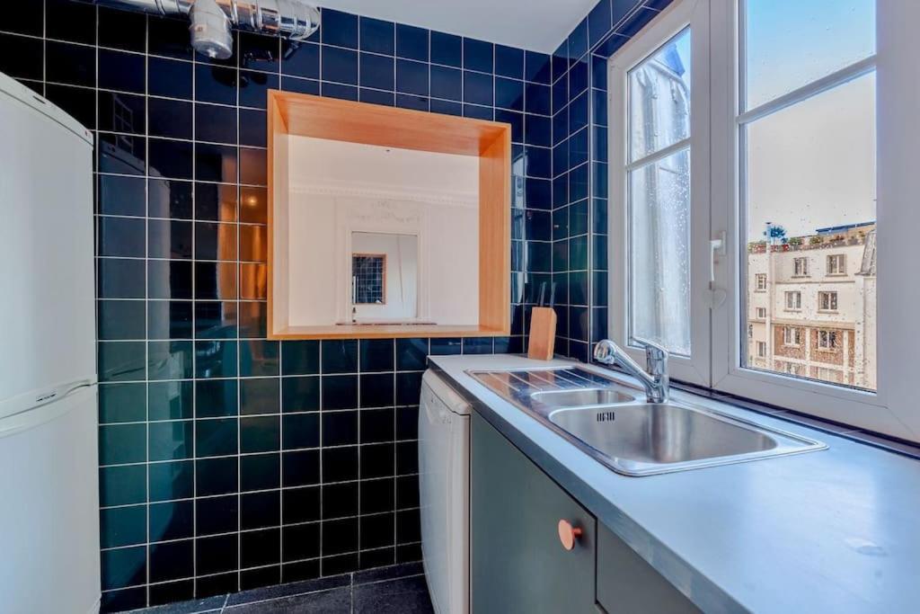 Charmant Appartement Au Coeur De Paris Eksteriør bilde